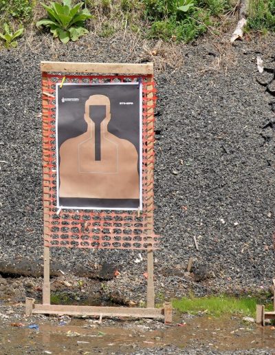paper target with bullet holes